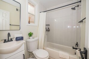 Bidet, towels, toilet paper