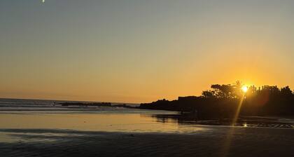 New 5 bedroom boutique hotel with AC in El Cuco, located steps from the beach.