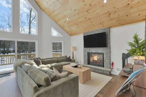 TV, fireplace - Cedar Woods Retreat | Pine Vaulted Chalet | HotTub (Big Bass Lake)