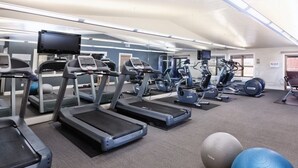 A gym with treadmills, elliptical machines, and exercise balls. - Spacious 2-bedroom condo in serene Steamboat Springs (Steamboat Springs)