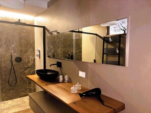 Hair dryer, towels, soap, shampoo