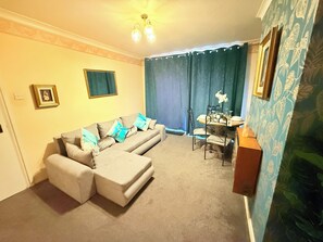 Ferienhaus, 4 Schlafzimmer, Küche, Gartenblick | Wohnbereich