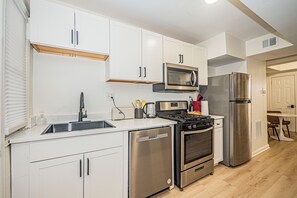Fridge, microwave, oven, stovetop - Your Cozy & Charming 2BR Getaway Near Downtown DC! (Washington)