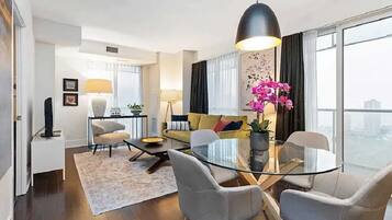 Grand Apartment | Living area | 50-inch Smart TV with digital channels