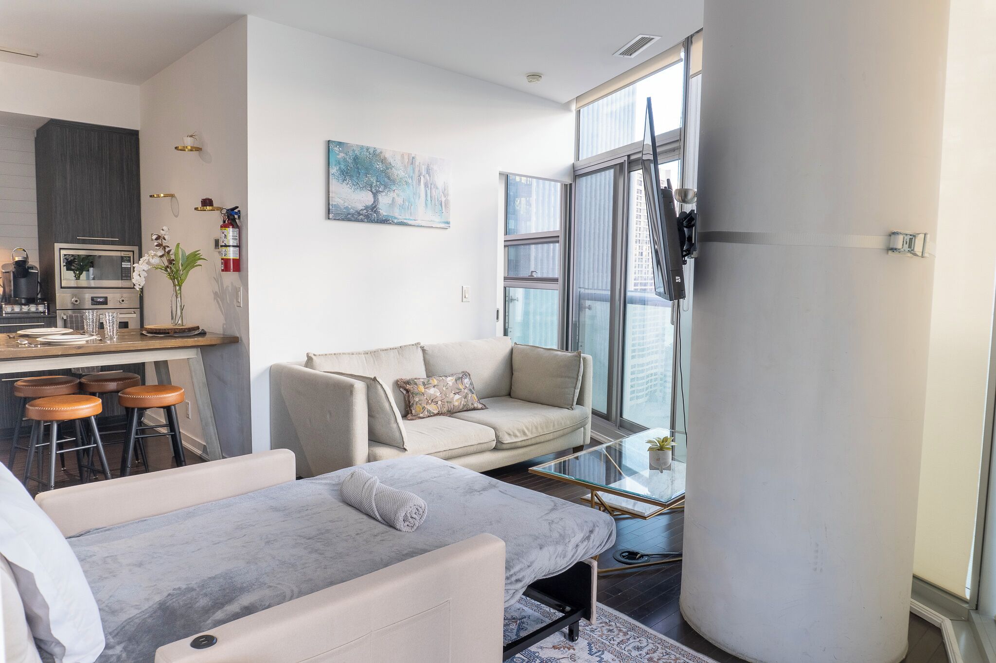 Comfort Double Room, City View | Living area | 50-inch Smart TV with digital channels