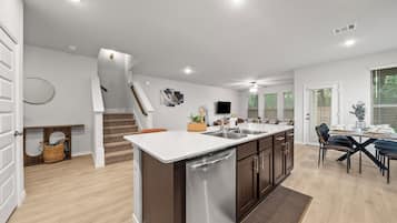 Luxury Duplex, Patio | Living area | 70-inch Smart TV with digital channels