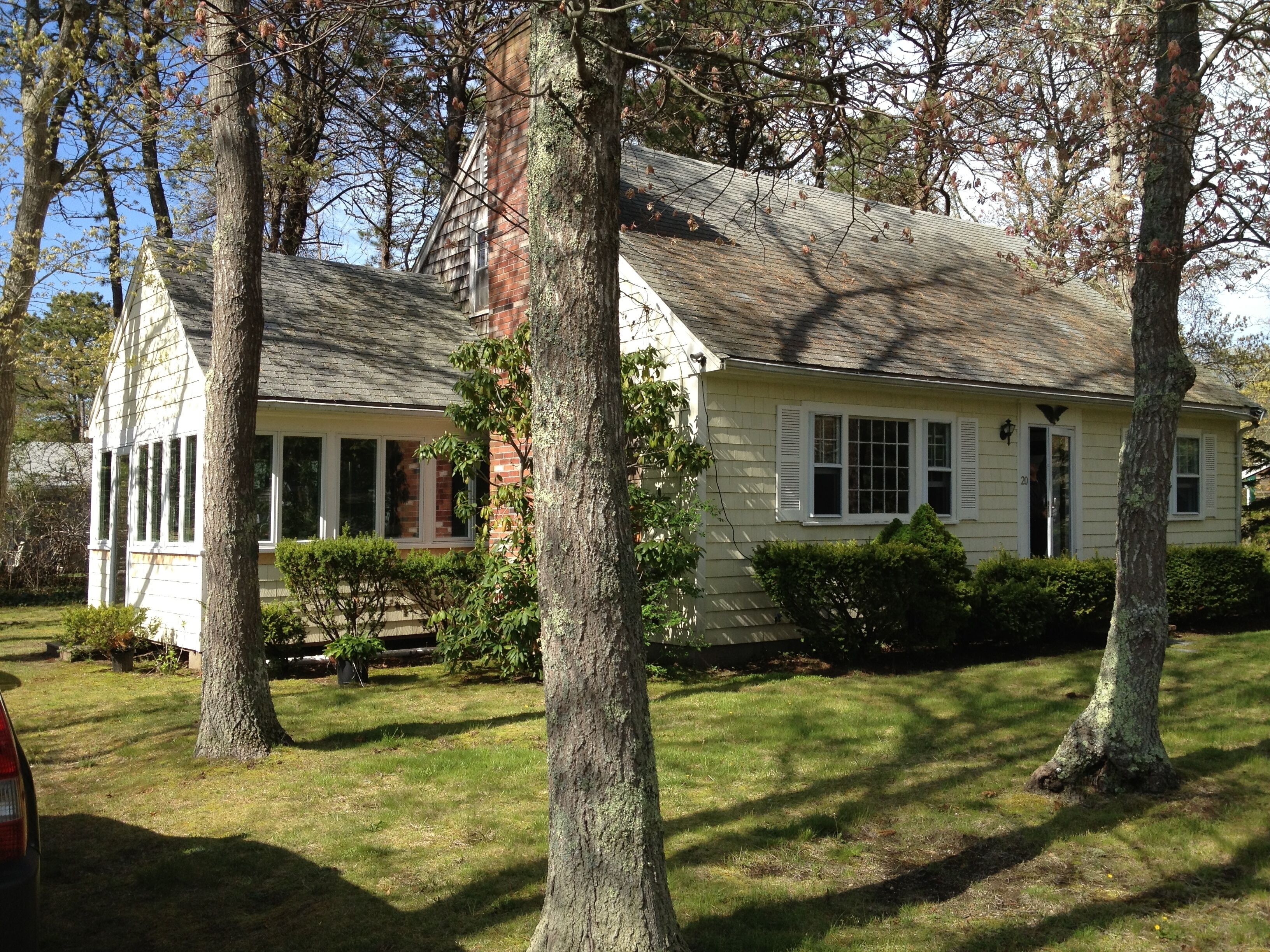 Three-season porch with adjustable windows to capture the perfect breeze.