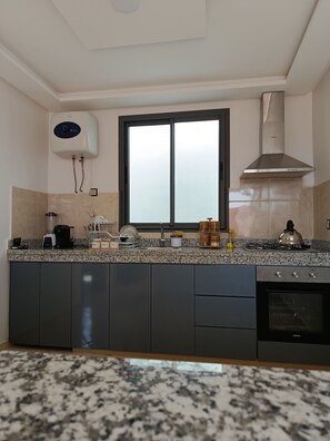 Private kitchen - Delightful 1-bedroom apartment in vibrant Agadir (agadir)