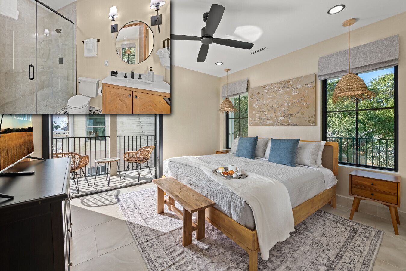 Une chambre moderne avec un grand lit, un balcon avec coin salon extérieur, un espace douche et une vue sur la verdure.