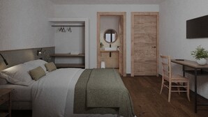 Ein Schlafzimmer mit einem Bett, einem Holztisch, einem Stuhl, einem Spiegel und einer Tür.
