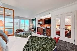 Luxury Studio Suite, Kitchenette, City View | Premium bedding, in-room safe, blackout drapes, iron/ironing board