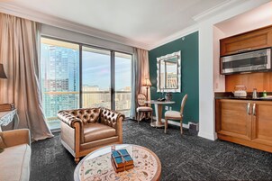 Luxury Studio Suite, Kitchenette, City View | Living area | Flat-screen TV
