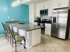 Fridge, microwave, oven, stovetop - Four Bedroom House Steps From the Beach (South Padre Island)