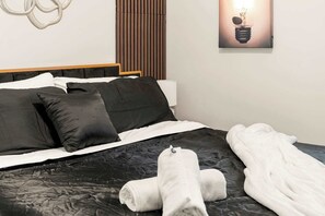 2 dormitorios, tabla de planchar con plancha, wifi y ropa de cama