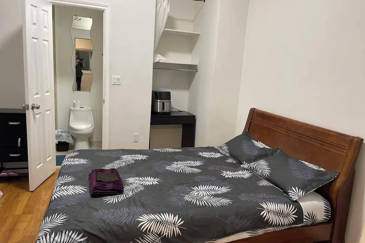 Family Triple Room, Courtyard View | Desk, laptop workspace, blackout drapes, iron/ironing board