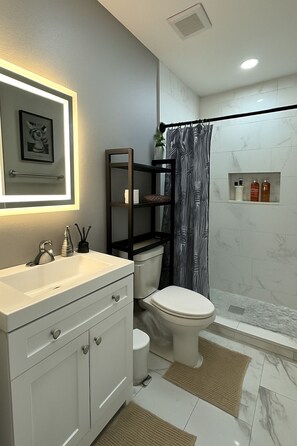 Hair dryer, towels, soap, shampoo