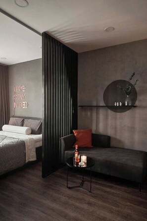 Luxury Studio Suite, City View | Desk, laptop workspace, blackout drapes, soundproofing - Sò Home (Ho Chi Minh)