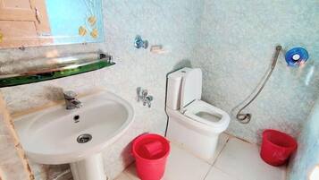 Deluxe Double Room, Balcony, Beach View | Bathroom | Bathtub, free toiletries, towels, soap