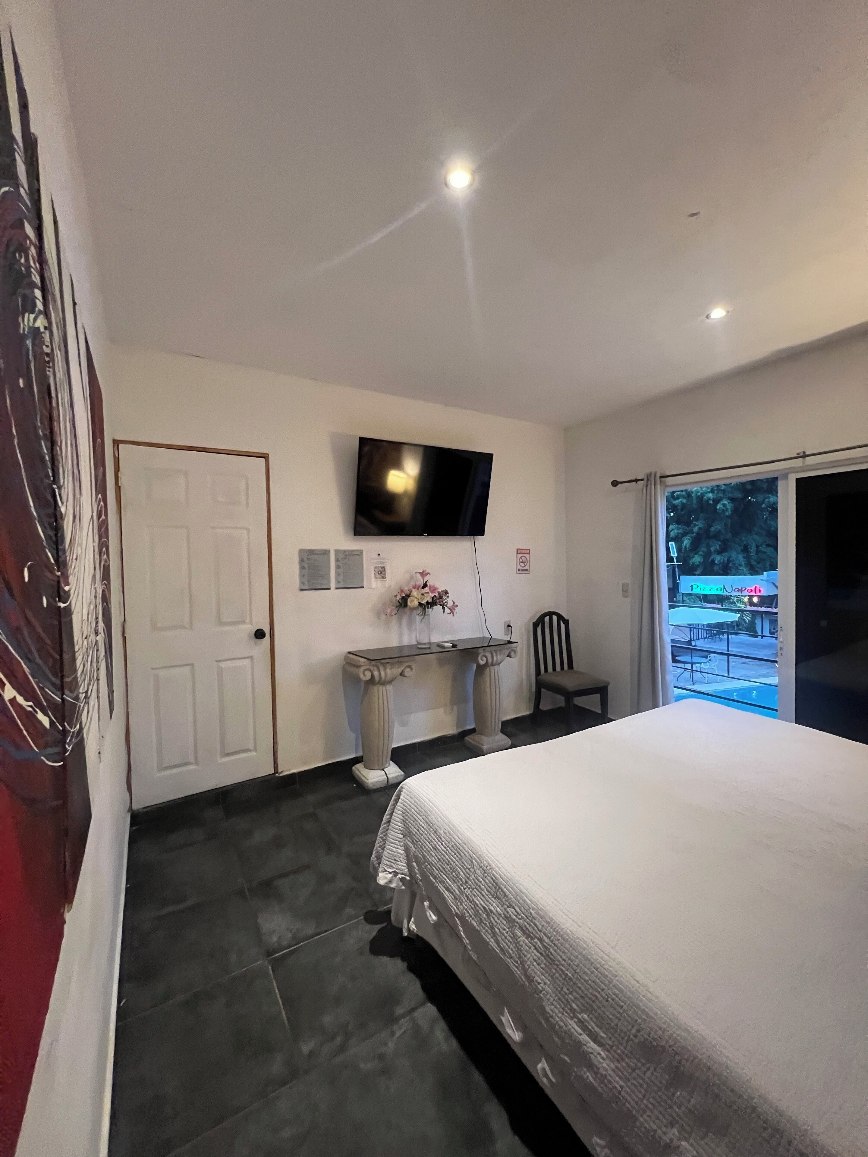 Deluxe Double Room, Balcony, Pool View | In-room safe, blackout curtains, iron/ironing board, free WiFi