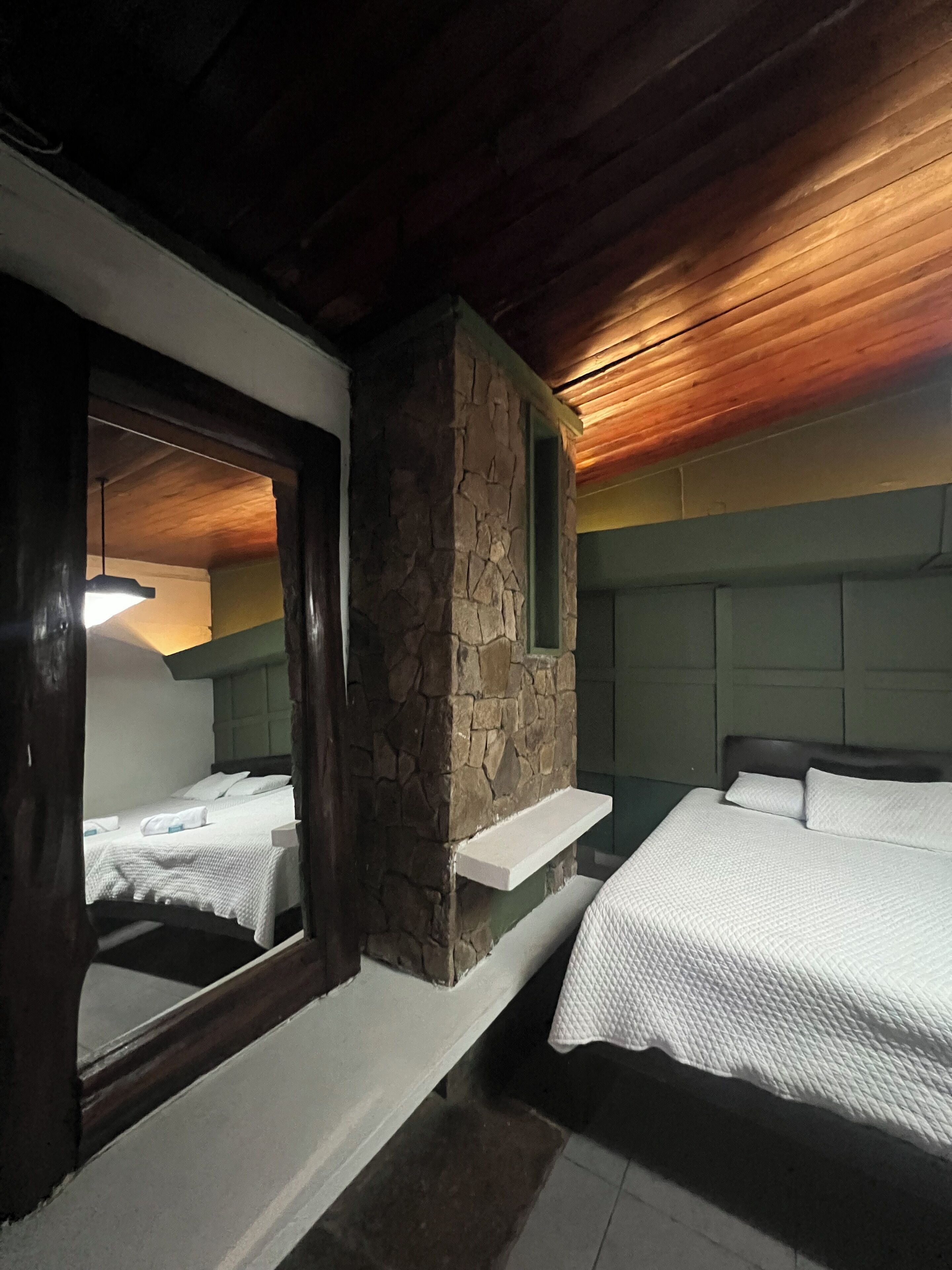 Deluxe Quadruple Room, Pool View | In-room safe, blackout drapes, iron/ironing board, free WiFi