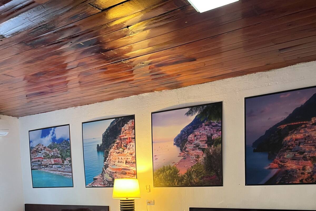 Deluxe Quadruple Room, Balcony - Positano | In-room safe, blackout drapes, iron/ironing board, WiFi (free)