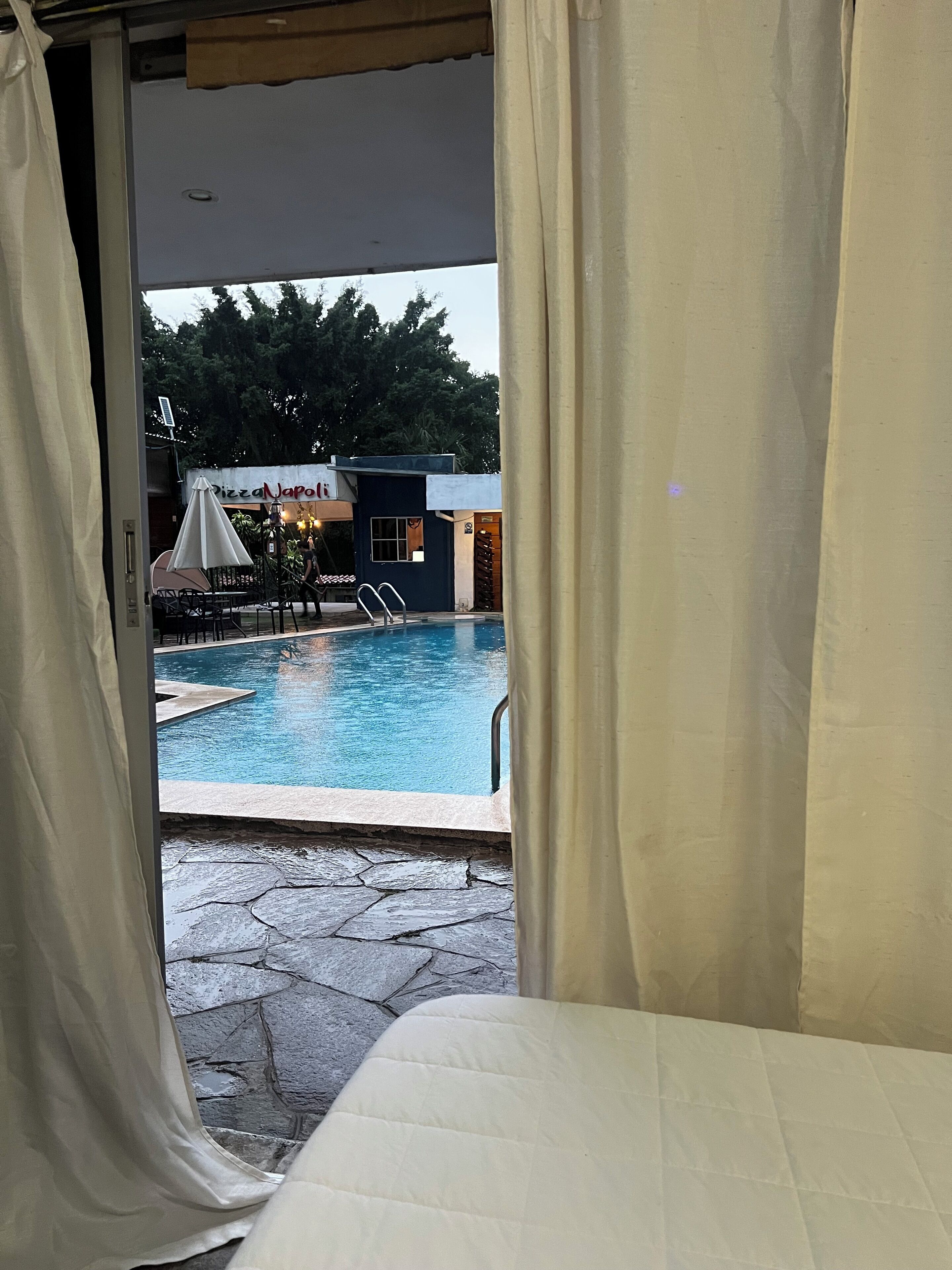 Deluxe Double Room, Pool View | In-room safe, blackout drapes, iron/ironing board, free WiFi