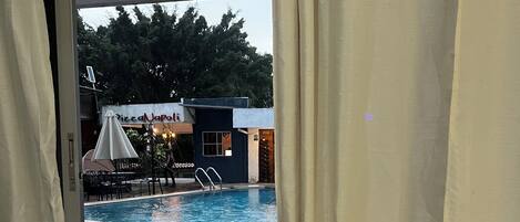 Deluxe Double Room, Pool View | In-room safe, blackout drapes, iron/ironing board, free WiFi