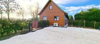 Luxury wooden house with spa bath and garden