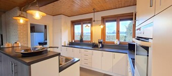 Luxury wooden house with spa bath and garden