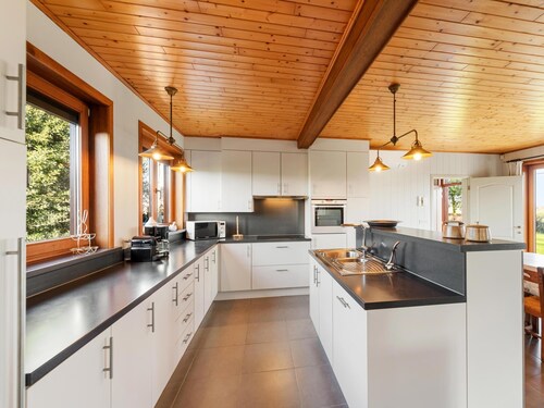 Luxury wooden house with spa bath and garden