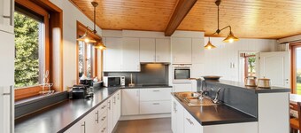 Luxury wooden house with spa bath and garden