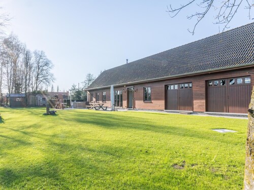 Luxury wooden house with spa bath and garden