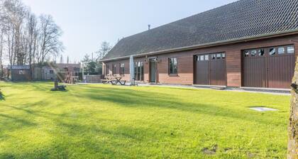 Luxury wooden house with spa bath and garden