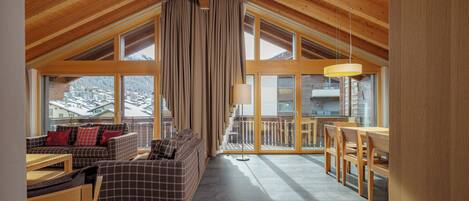 Superior Penthouse, Mountain View | Living area | 40-inch TV with cable channels
