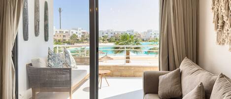 Basic Apartment | Living area | 55-inch TV with cable channels