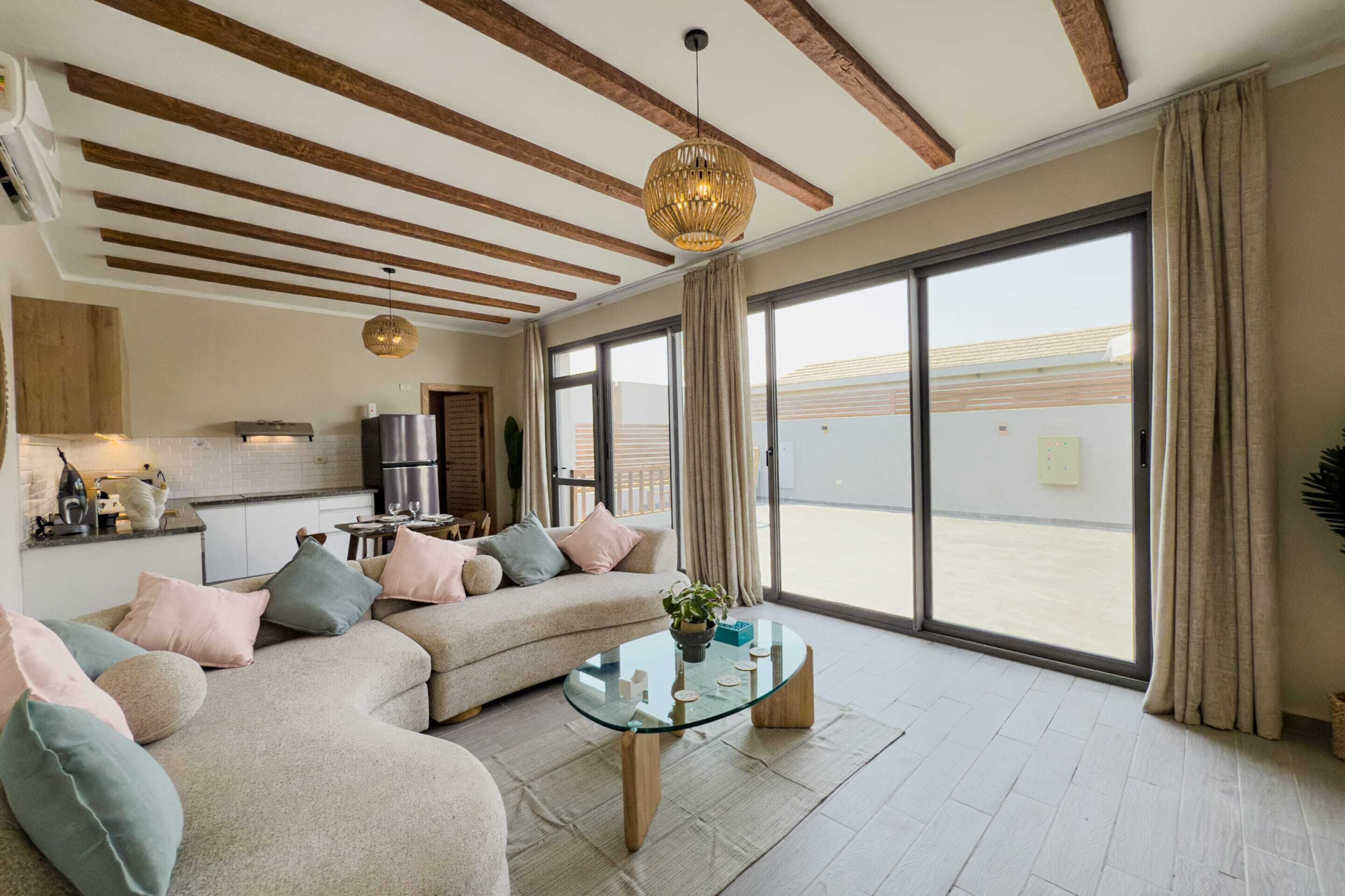 Basic Villa | Living area | 55-inch TV with cable channels
