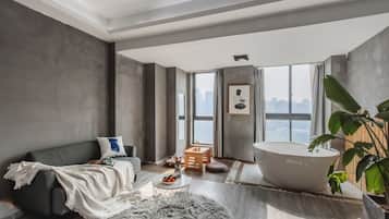 Signature Apartment, 1 Queen Bed, Hot Tub, River View | Desk, laptop workspace, free WiFi, bed sheets