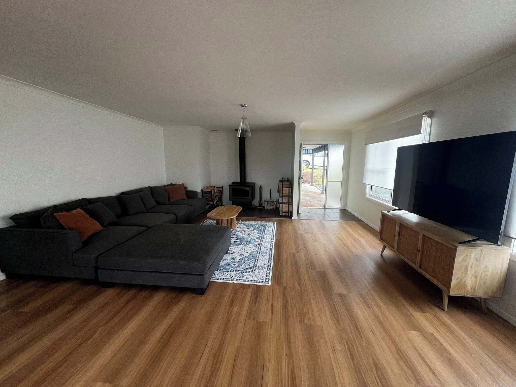 Smart TV, fireplace, books