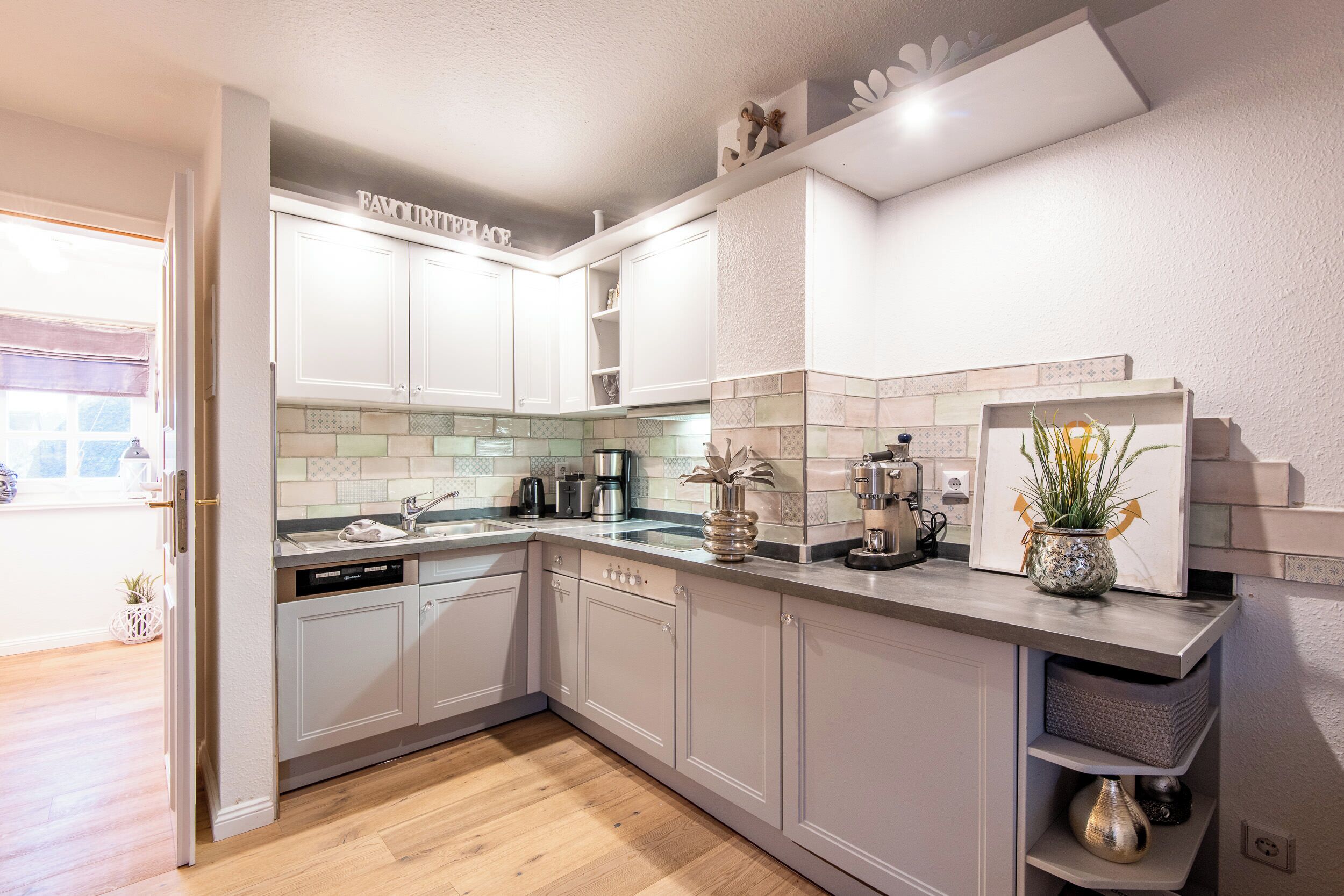 Coffee/tea maker, fridge, stovetop, dishwasher