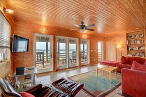 TV, books - TWO Soundfront Retreat Homes - Great for Groups - 7BR total in Topsail Beach (Topsail Beach)
