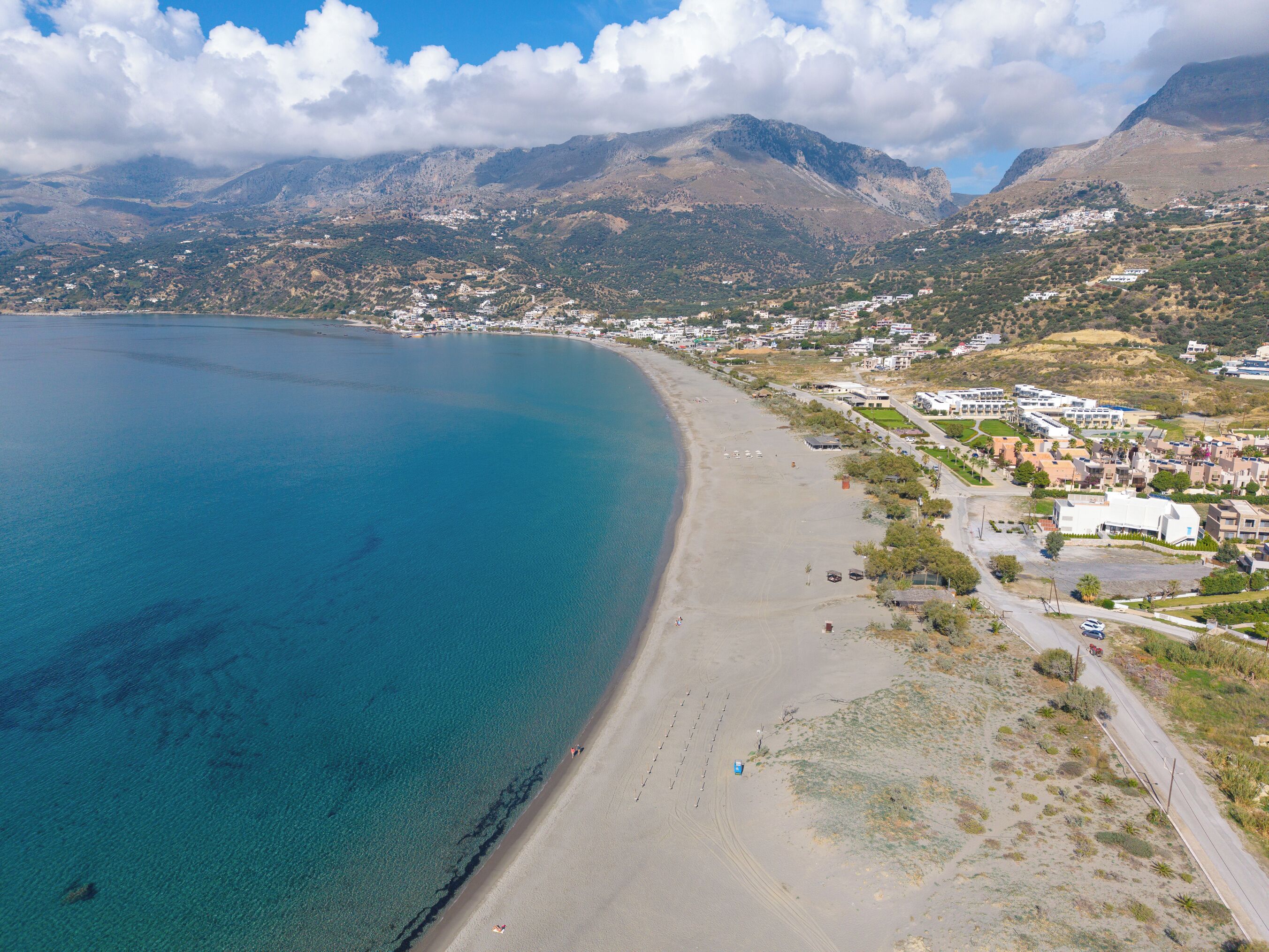 On the beach, sun loungers, beach towels