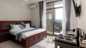 In-room safe, desk, laptop workspace, blackout curtains - BEAL MALL AND HOTEL (Arua)