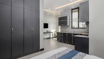 Suite, Balcony, City View | In-room safe, desk, laptop workspace, blackout curtains