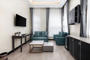 Apartamento Deluxe, balcón, vistas a la ciudad | Zona de estar