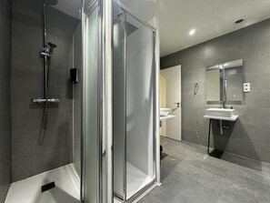 Shower, hair dryer, soap, shampoo