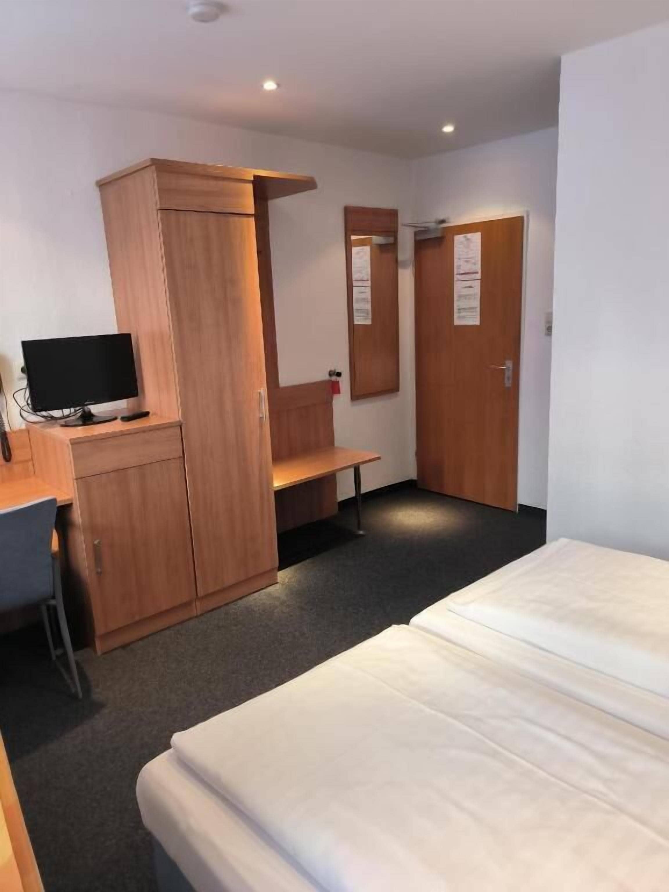 Chambre Confort avec lits jumeaux, vue cour intérieure | Bureau, espace de travail pour ordinateur portable, Wi-Fi gratuit