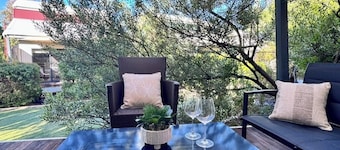 Welcome to Coastal Breeze Beach Villa surrounded by nature.