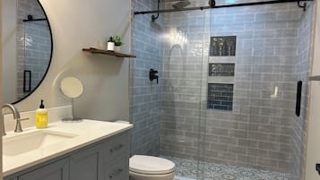Shower, eco-friendly toiletries, hair dryer, towels