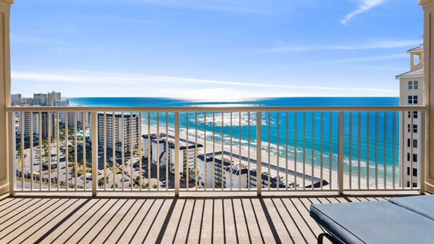 A balcony with a view of the beach and ocean. - Penthouse Premium 3BR Condo - 1900+ Sq Ft - Beach Service Included (Panama City Beach)