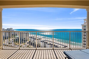 A balcony with a view of the beach and ocean. - Penthouse Premium 3BR Condo - 1900+ Sq Ft - Beach Service Included (Panama City Beach)